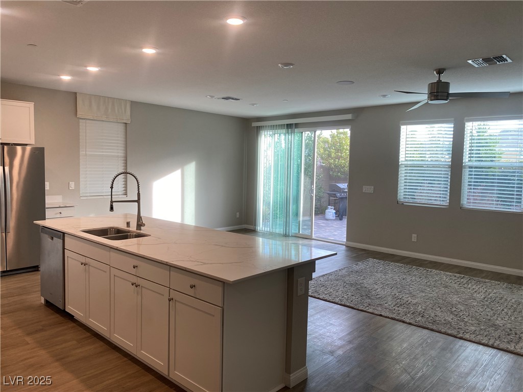 9343 Sully Avenue Las Vegas, NV 89149 - Photo 27 of 27 Kitchen featuring open floor plan, a sink, applian