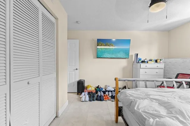 a bed room with a bed and furniture