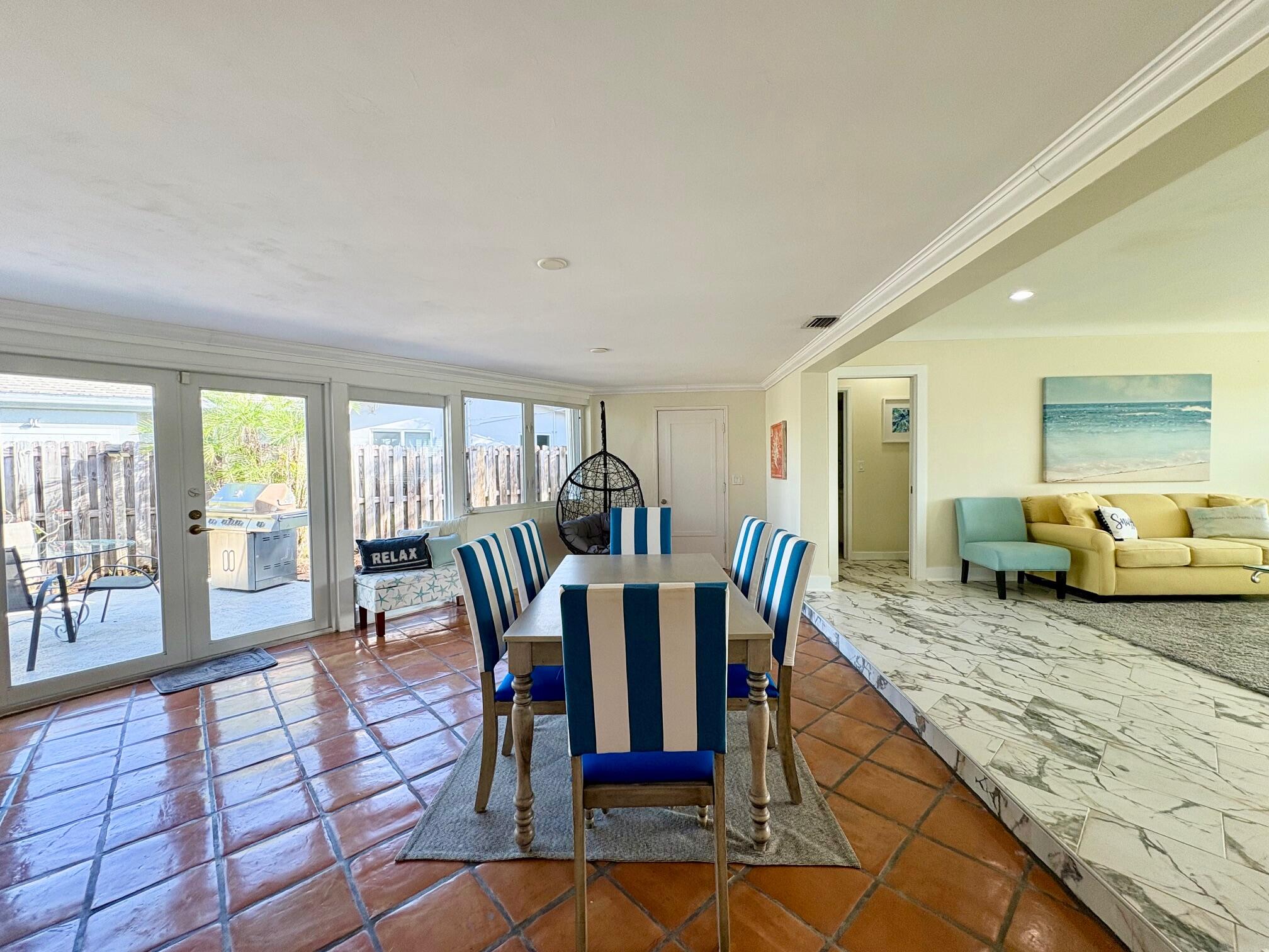 999 Southeast 6th Terrace Pompano Beach, FL 33060 - Photo 8 of 25 a view of a dining room with furniture