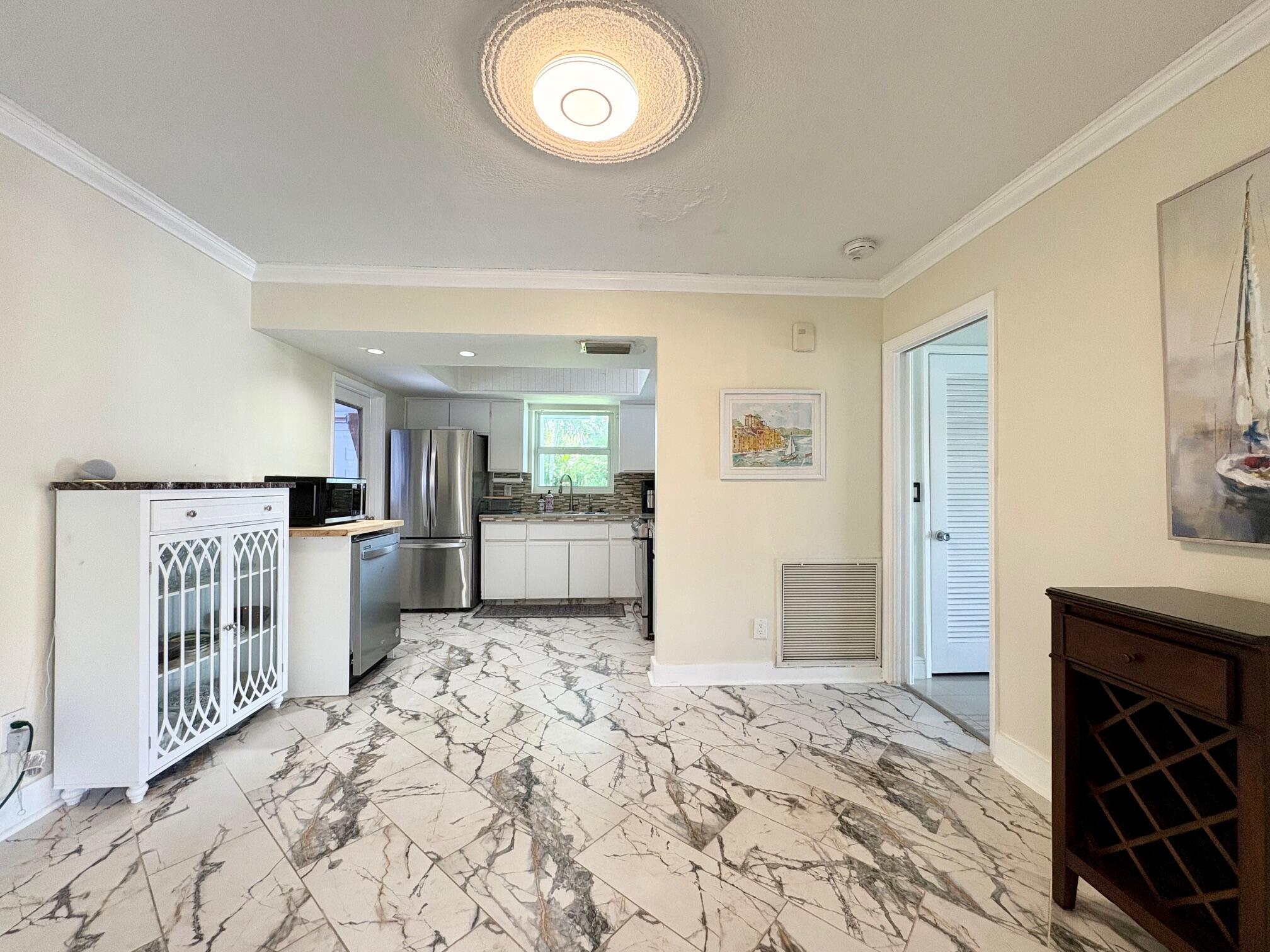 999 Southeast 6th Terrace Pompano Beach, FL 33060 - Photo 10 of 25 a view of a kitchen