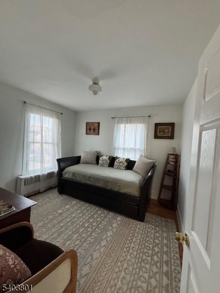 9 Madison Street Newton, NJ 07860 - Photo 4 of 13 a living room with furniture window and a table