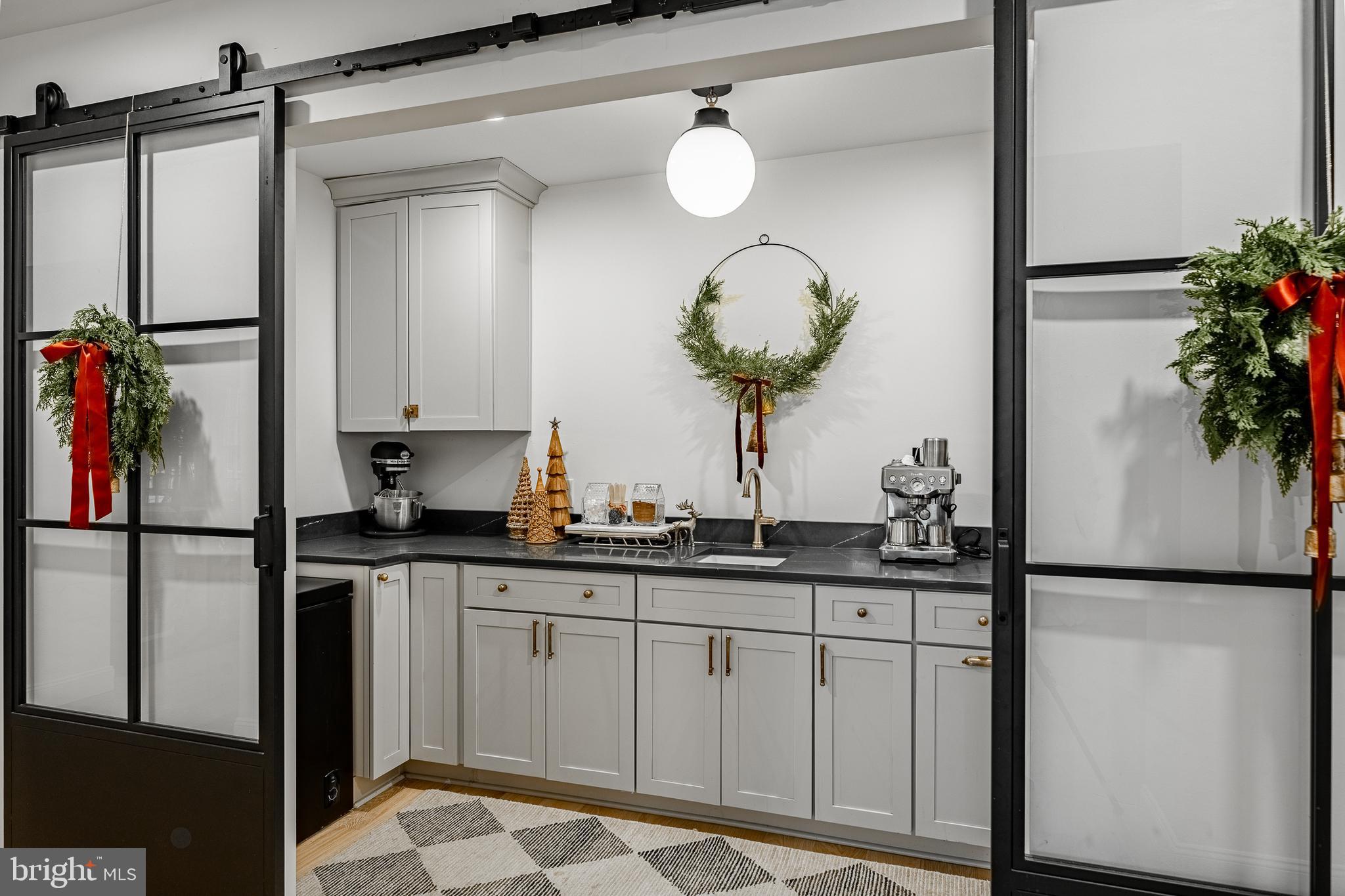 504 Kennett Pike Chadds Ford, PA 19317 - Photo 16 of 75 a kitchen with a sink and a refrigerator