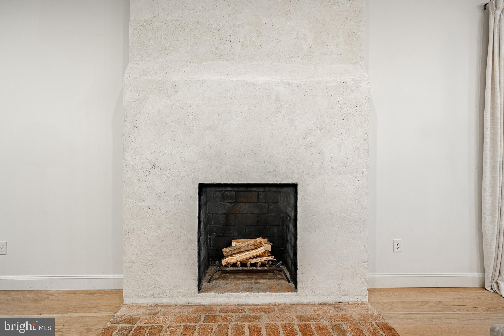 504 Kennett Pike Chadds Ford, PA 19317 - Photo 21 of 75 a room with a bench and a wooden floor