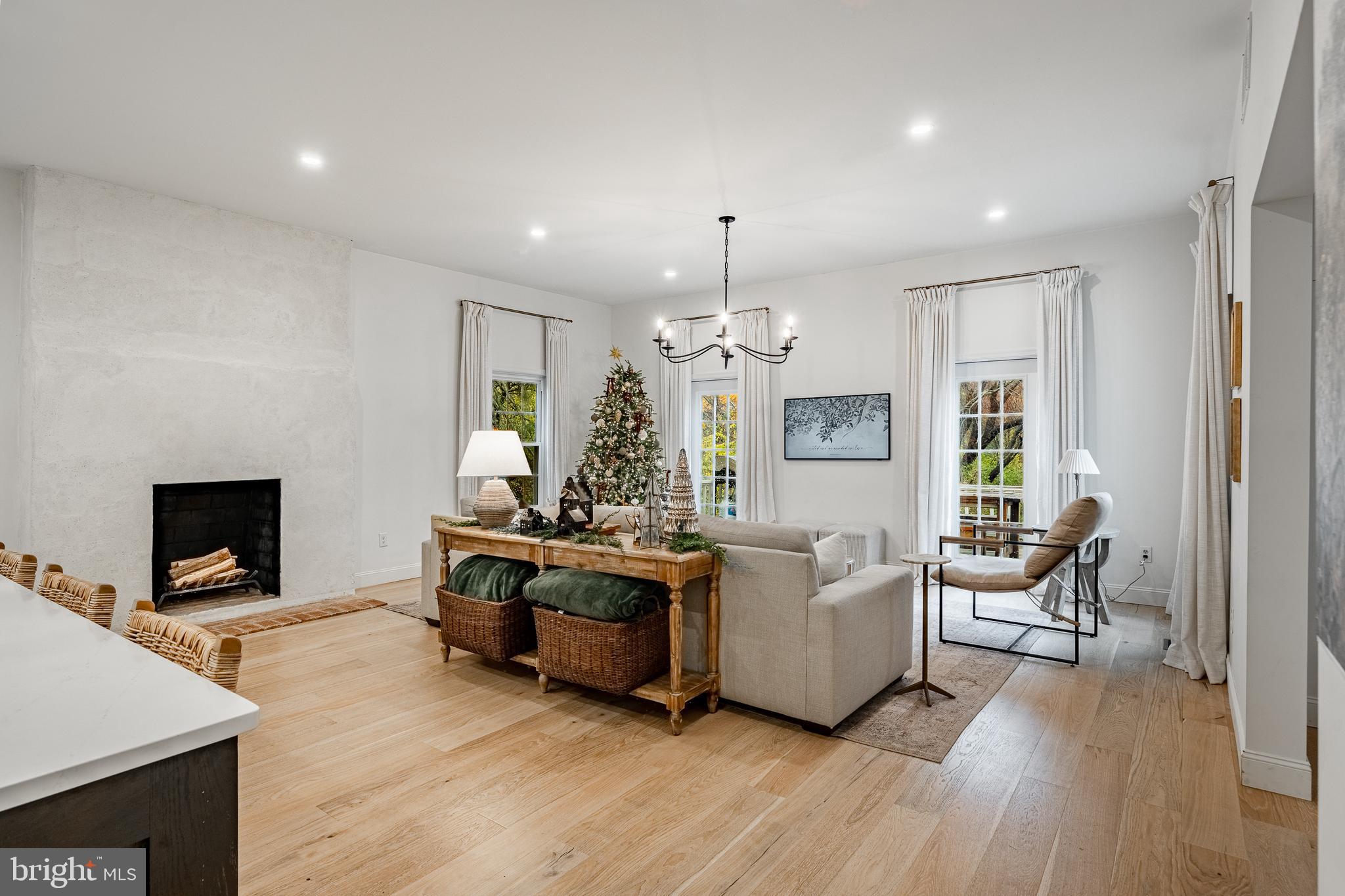 504 Kennett Pike Chadds Ford, PA 19317 - Photo 22 of 75 a living room with furniture flat screen tv and fireplace
