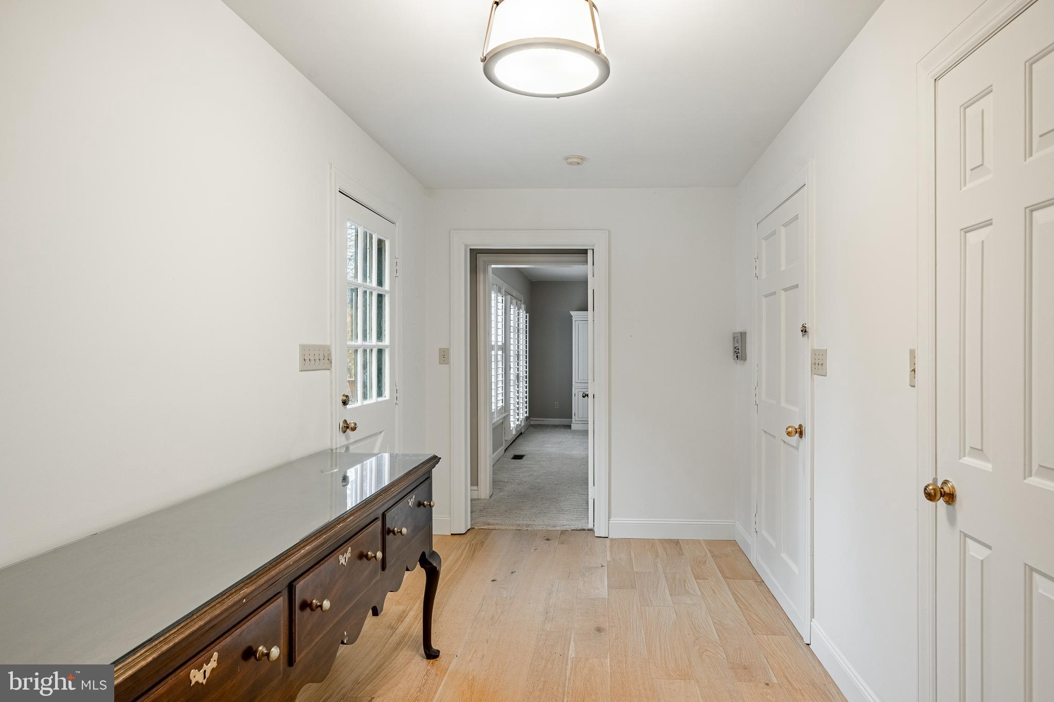 504 Kennett Pike Chadds Ford, PA 19317 - Photo 29 of 75 a view of a room that has a lot of cabinets wooden floor and window