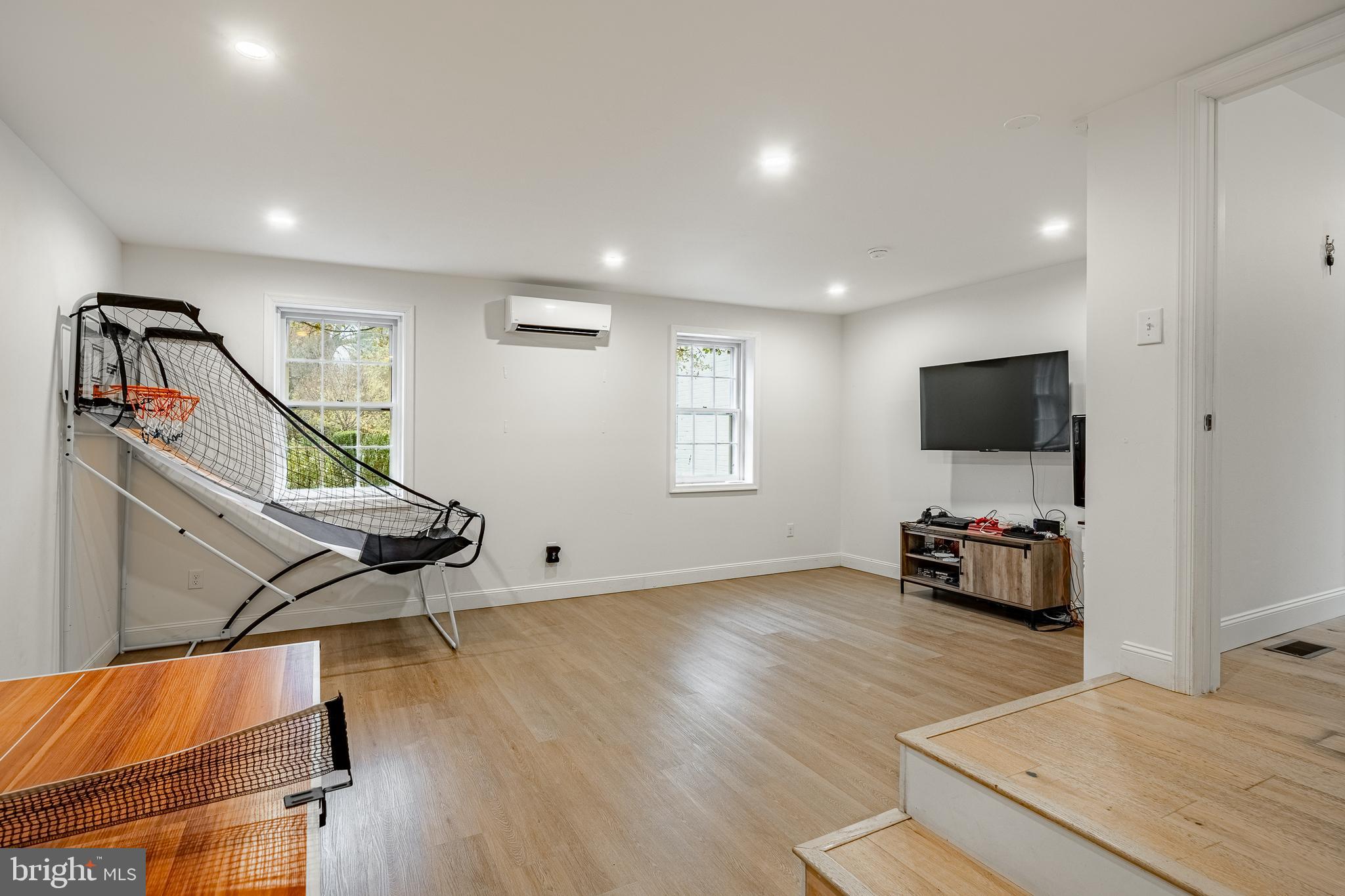 504 Kennett Pike Chadds Ford, PA 19317 - Photo 31 of 75 a living room with furniture and a flat screen tv