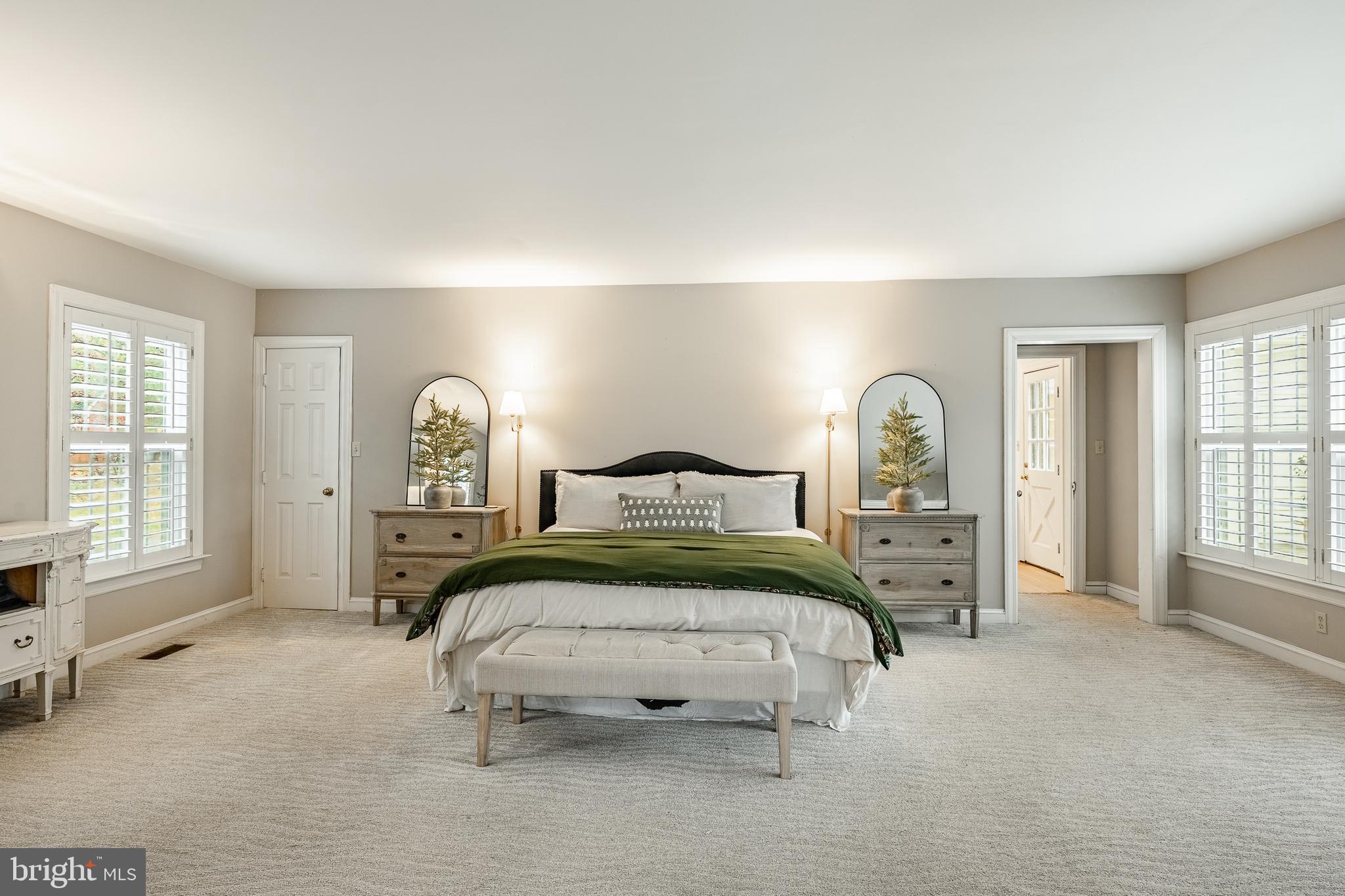 504 Kennett Pike Chadds Ford, PA 19317 - Photo 35 of 75 a bedroom with a bed and a large window