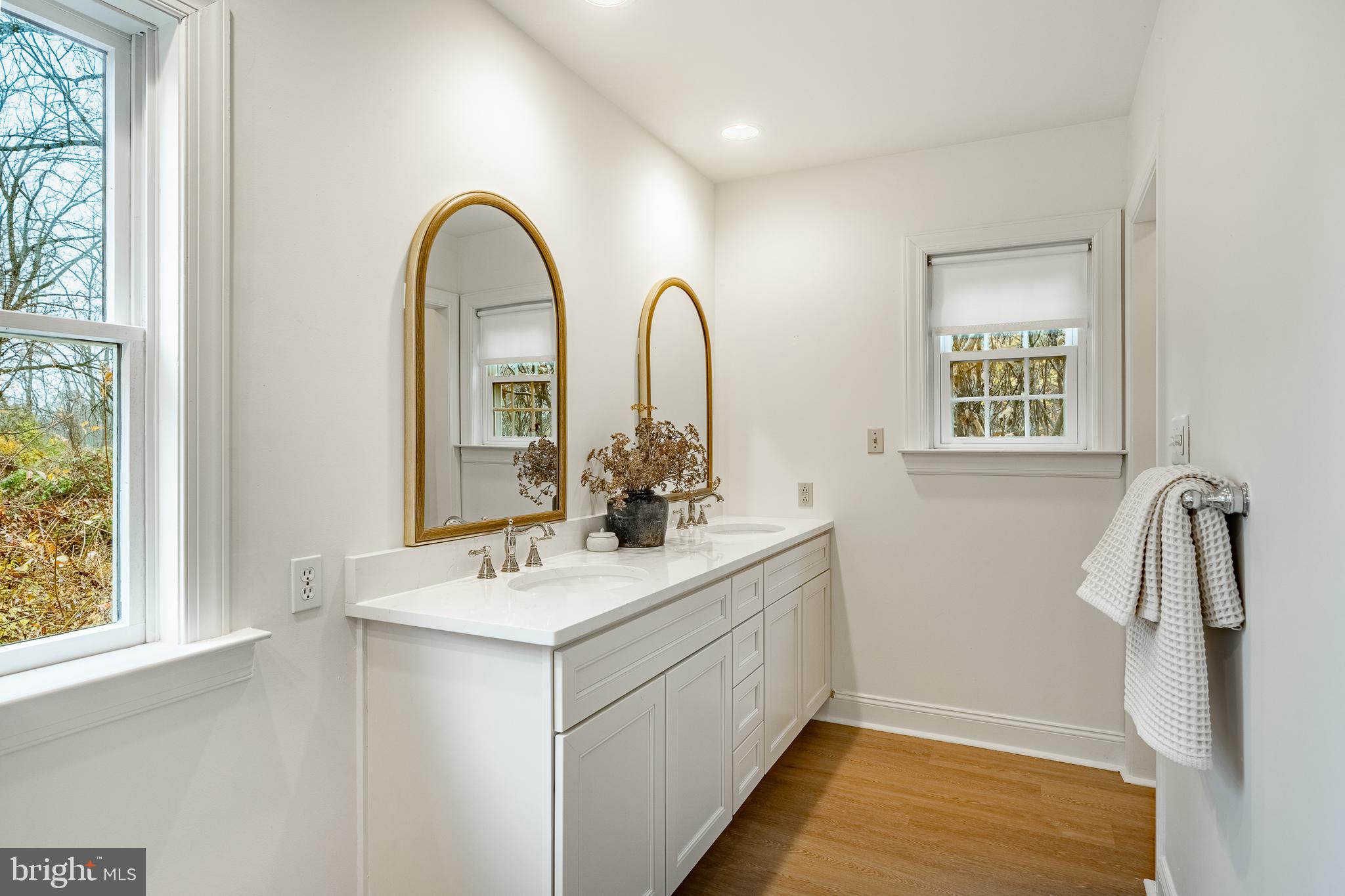 504 Kennett Pike Chadds Ford, PA 19317 - Photo 37 of 75 a bathroom with a sink and a mirror