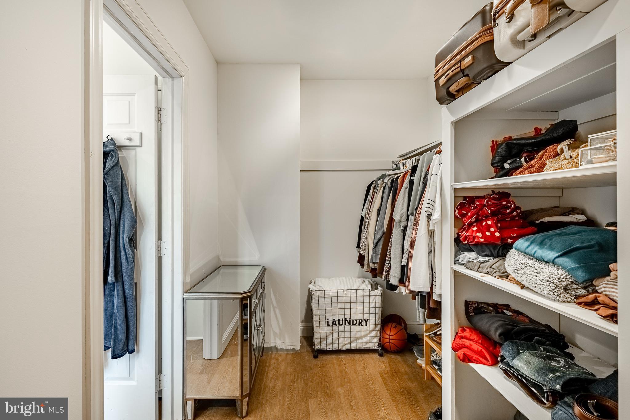 504 Kennett Pike Chadds Ford, PA 19317 - Photo 42 of 75 a view of walk in closet with clothes and shoes