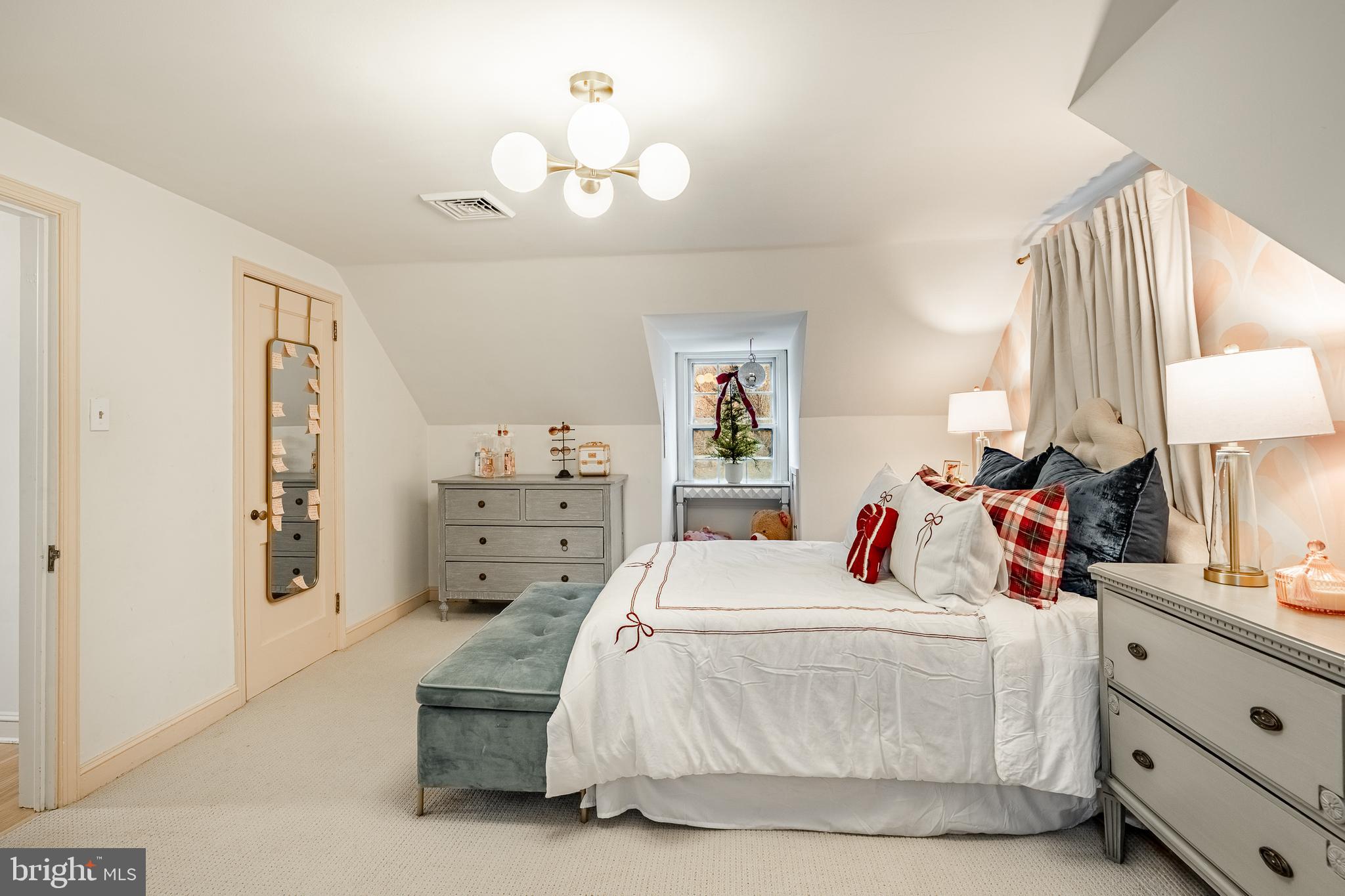 504 Kennett Pike Chadds Ford, PA 19317 - Photo 46 of 75 a bedroom with a bed and a chandelier