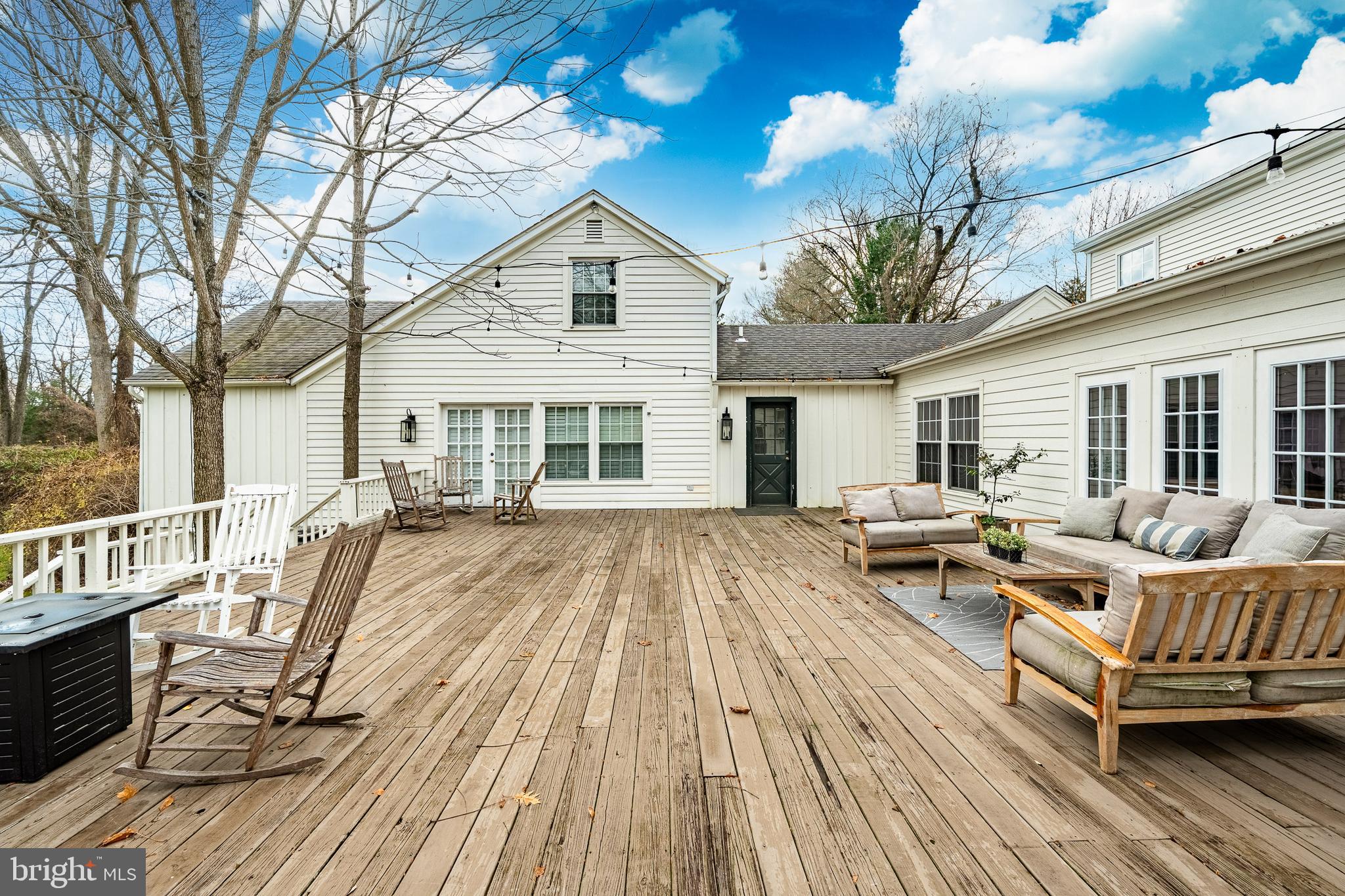 504 Kennett Pike Chadds Ford, PA 19317 - Photo 56 of 75 a view of a house with a bench and wooden floor