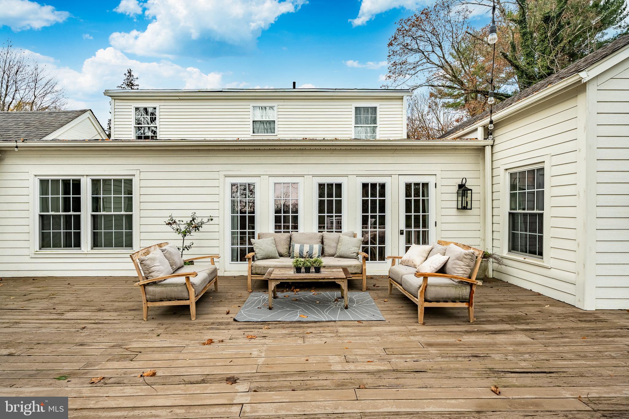 504 Kennett Pike Chadds Ford, PA 19317 - Photo 57 of 75 a view of a house with backyard porch and sitting area
