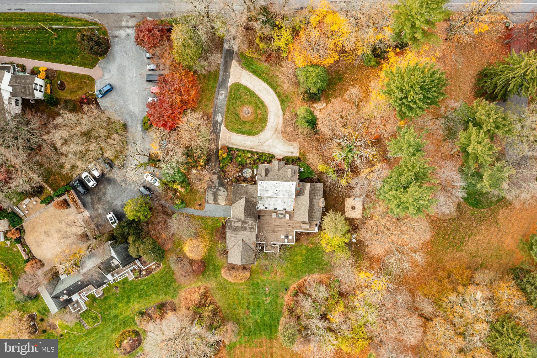 504 Kennett Pike Chadds Ford, PA 19317 - Photo 71 of 75 a building with swimming pool and trees in the background