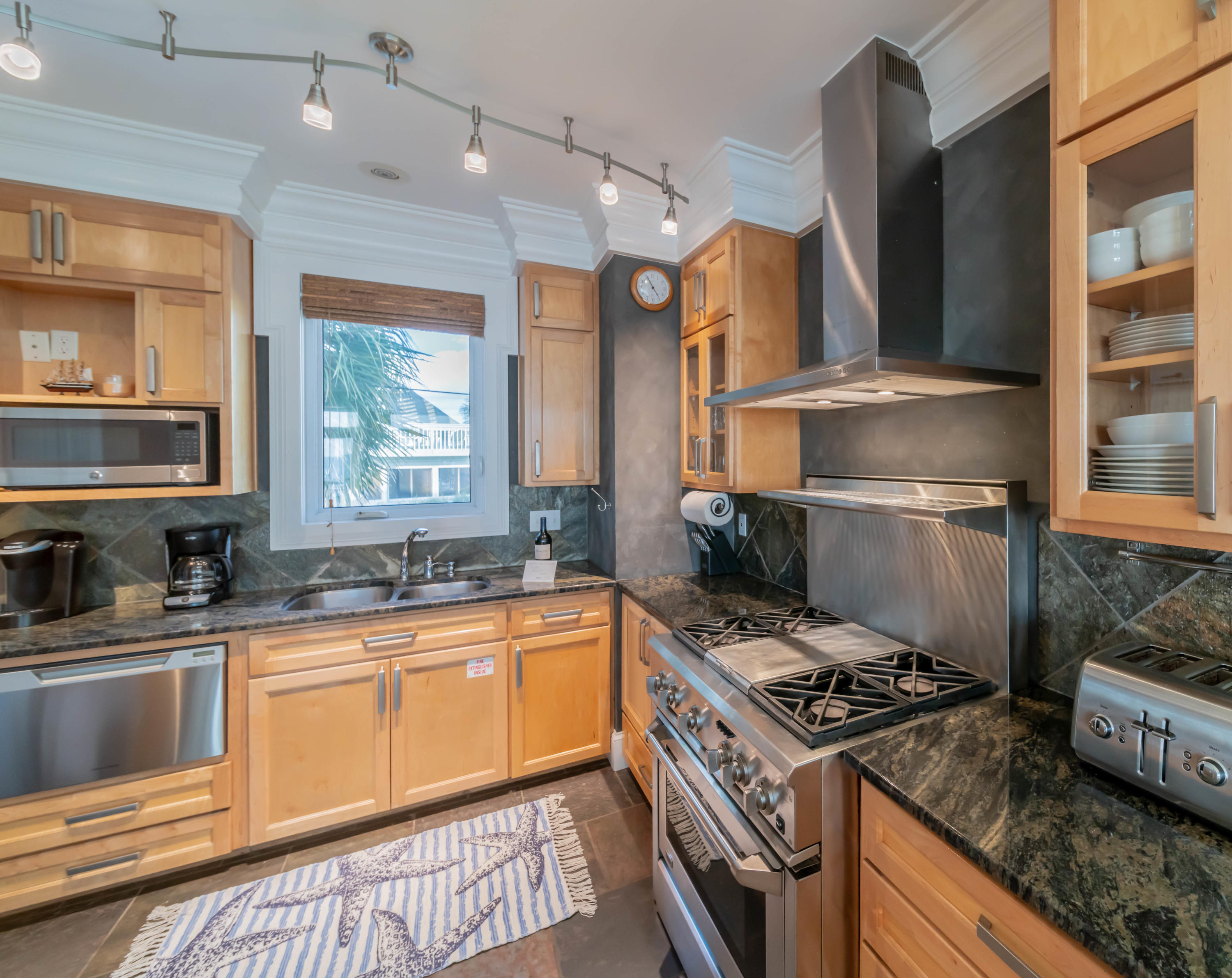 260 South Wall Street Inlet Beach, FL 32461 - Photo 11 of 59 a kitchen with a stove and a sink