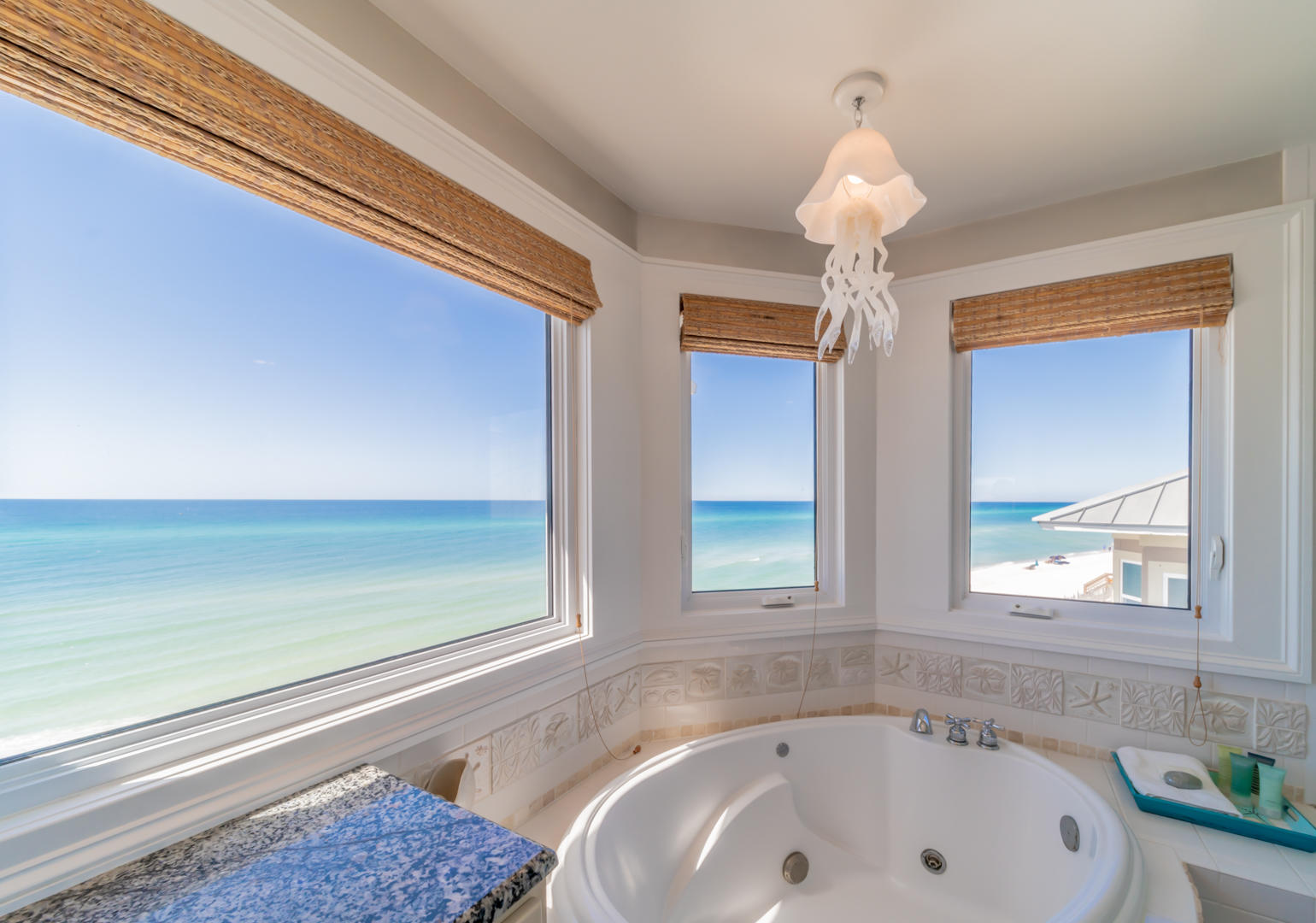 260 South Wall Street Inlet Beach, FL 32461 - Photo 18 of 59 a bathroom with a bathtub and a window
