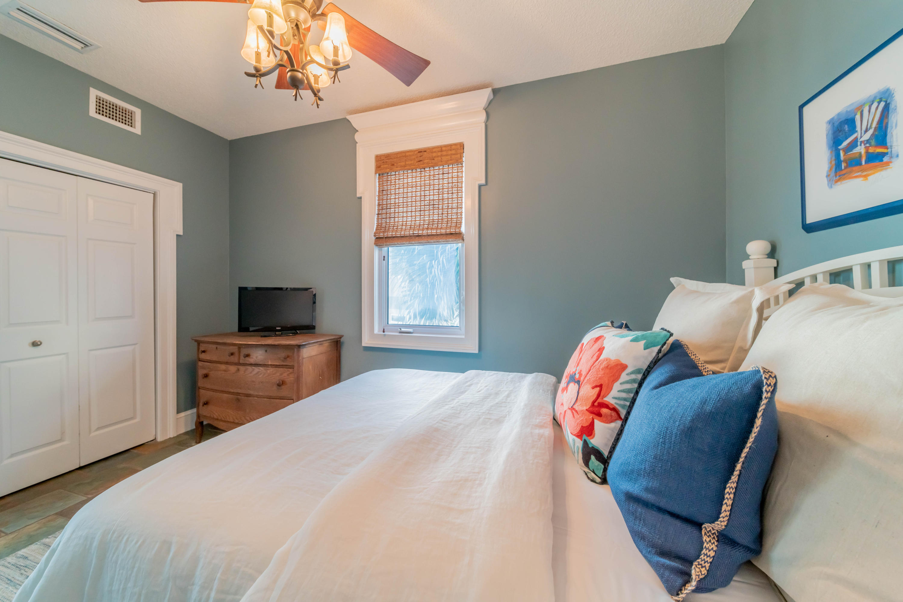 260 South Wall Street Inlet Beach, FL 32461 - Photo 20 of 59 a bedroom with a bed and a television