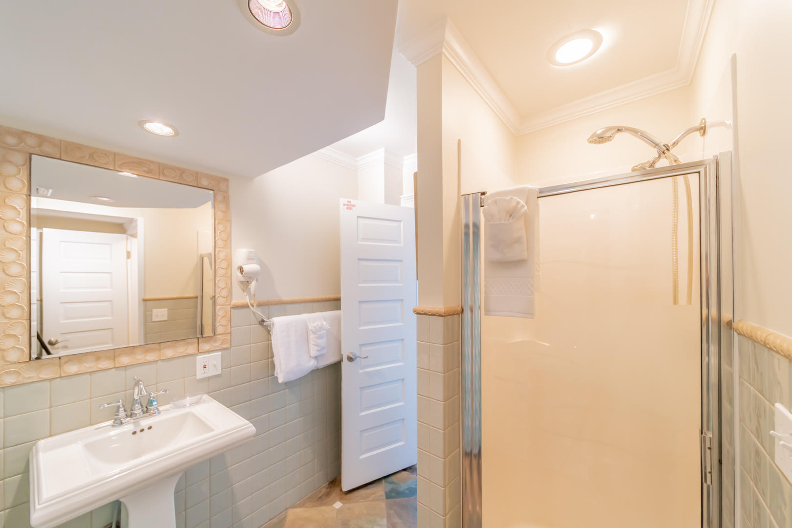 260 South Wall Street Inlet Beach, FL 32461 - Photo 31 of 59 a bathroom with a shower sink and mirror