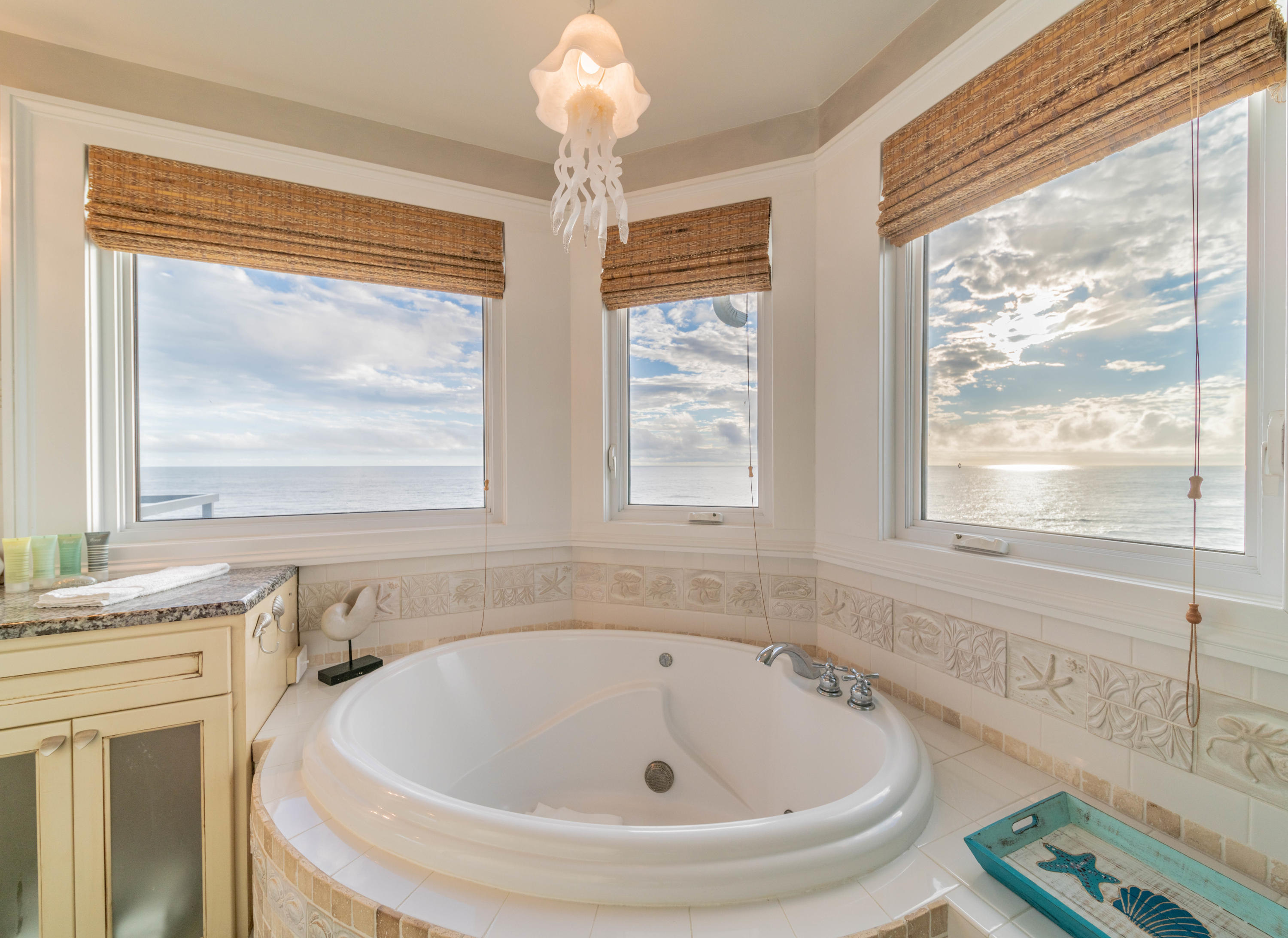 260 South Wall Street Inlet Beach, FL 32461 - Photo 44 of 59 a bathroom with a tub and a sink