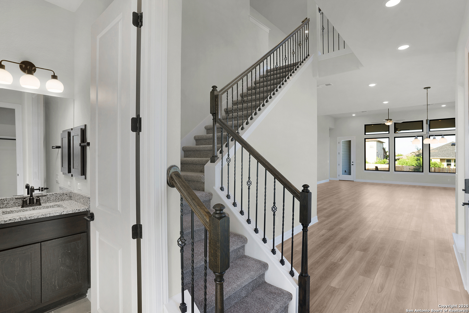 972 Nolte Bend Seguin, TX 78155 - Photo 12 of 65 a view of entryway and hall with wooden floor