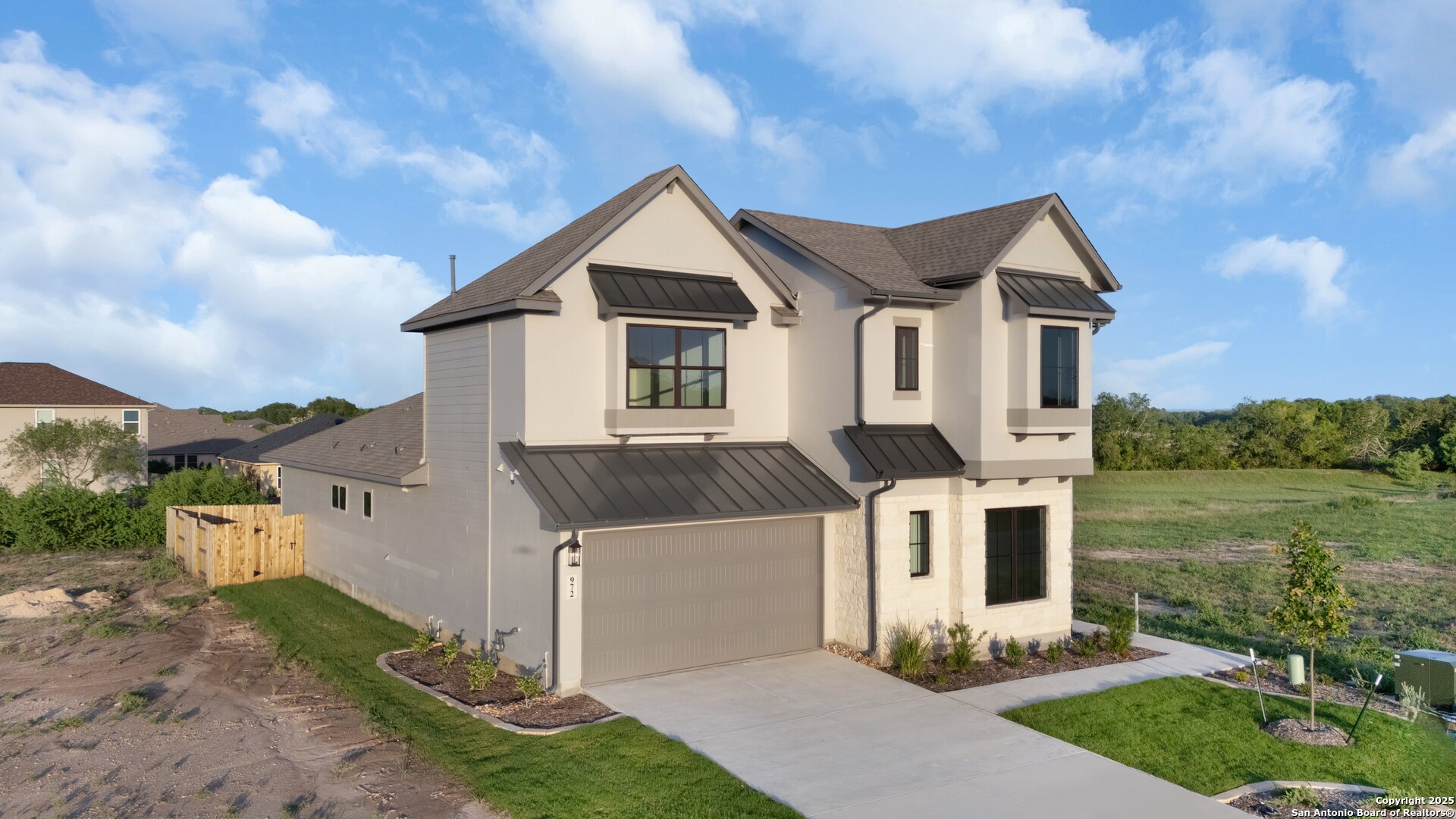 972 Nolte Bend Seguin, TX 78155 - Photo 2 of 65 a front view of a house with garden
