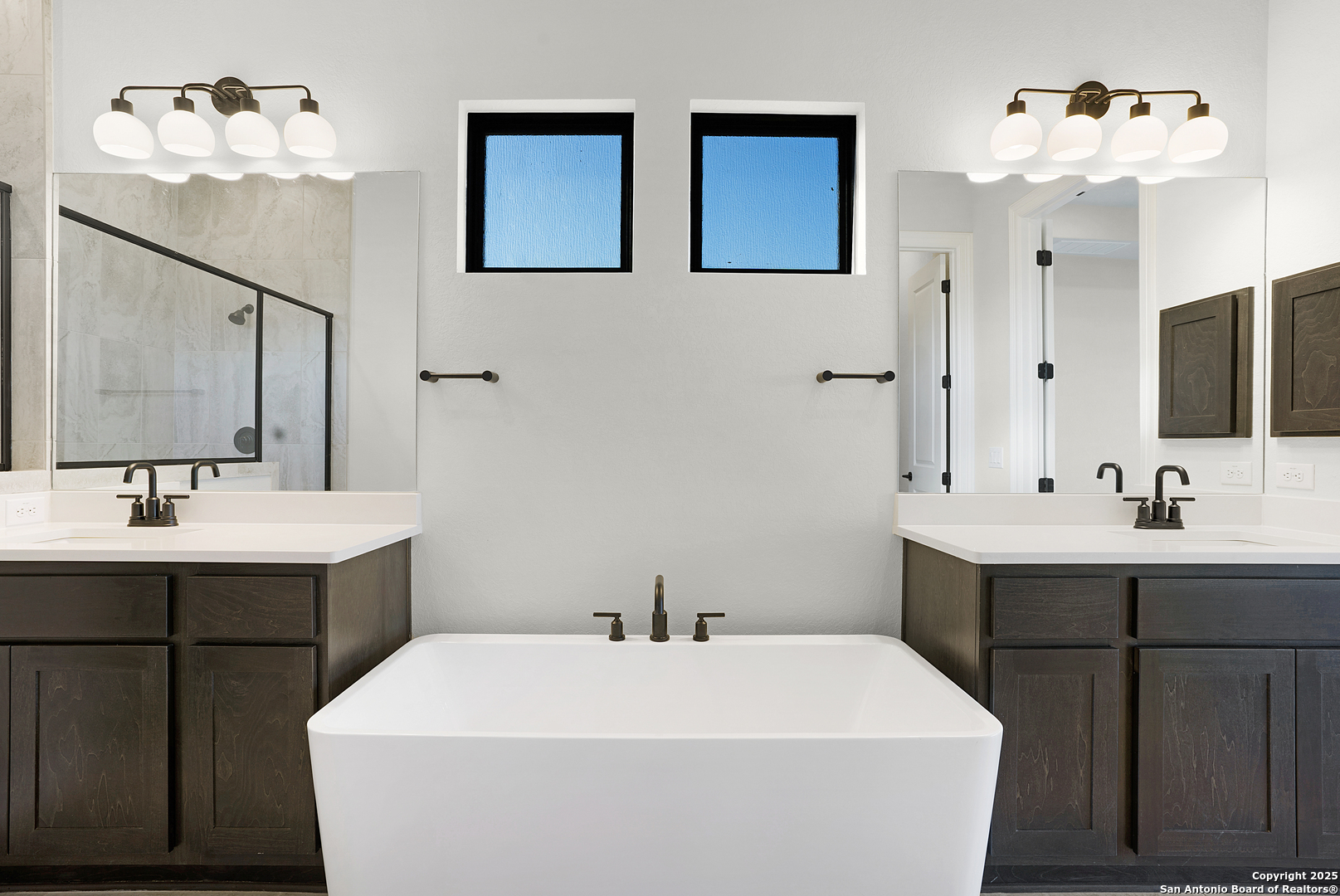972 Nolte Bend Seguin, TX 78155 - Photo 39 of 65 a bathroom with a sink a toilet and mirror