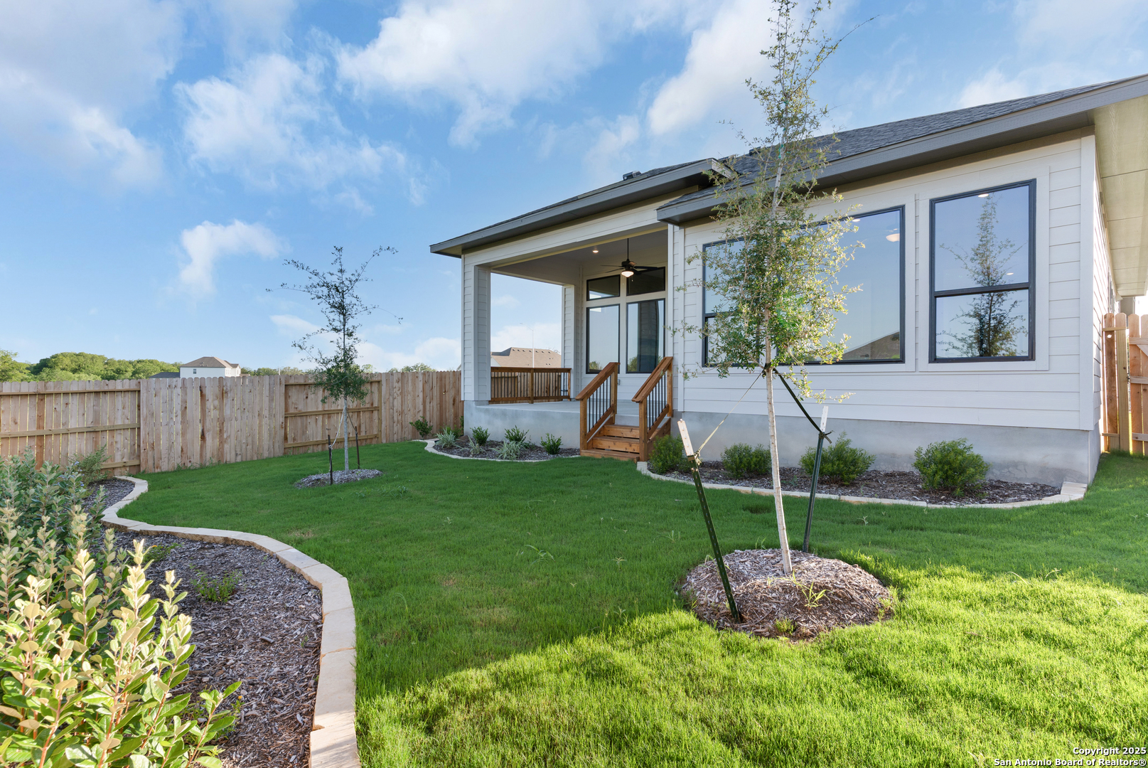 972 Nolte Bend Seguin, TX 78155 - Photo 61 of 65 a view of a house with backyard and porch