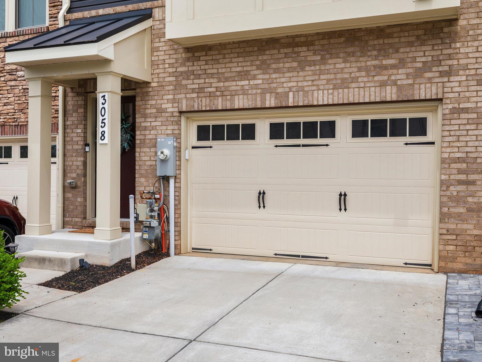 3058 Bretons Ridge Way Hanover, MD 21076 - Photo 2 of 43 a view of a building with entrance gate