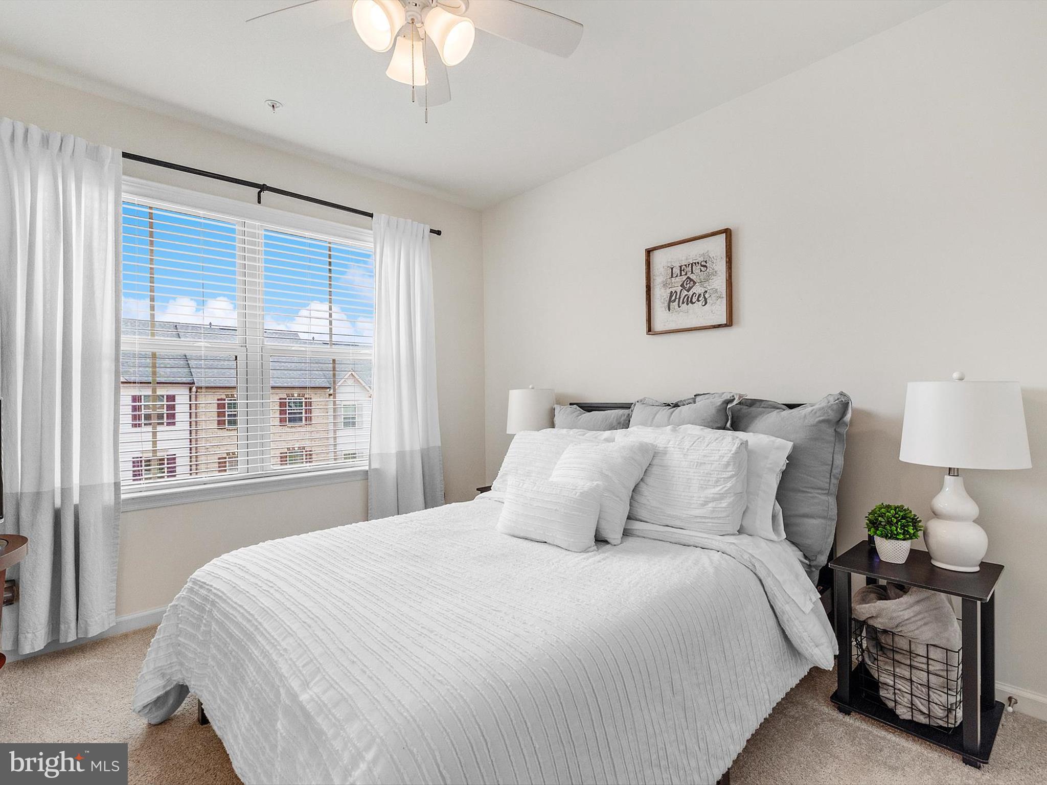 3058 Bretons Ridge Way Hanover, MD 21076 - Photo 21 of 43 a bedroom with a bed window and a chandelier