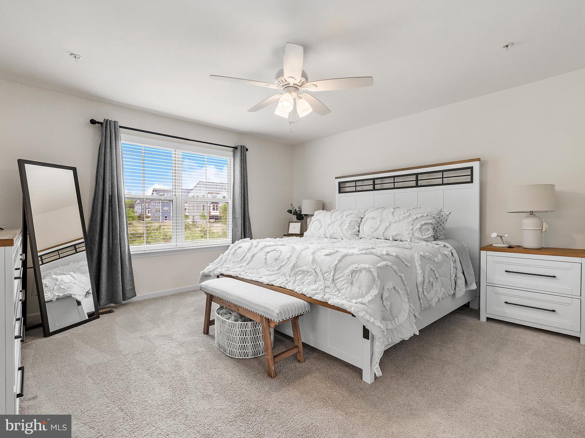 3058 Bretons Ridge Way Hanover, MD 21076 - Photo 25 of 43 a spacious bedroom with a bed and a dresser