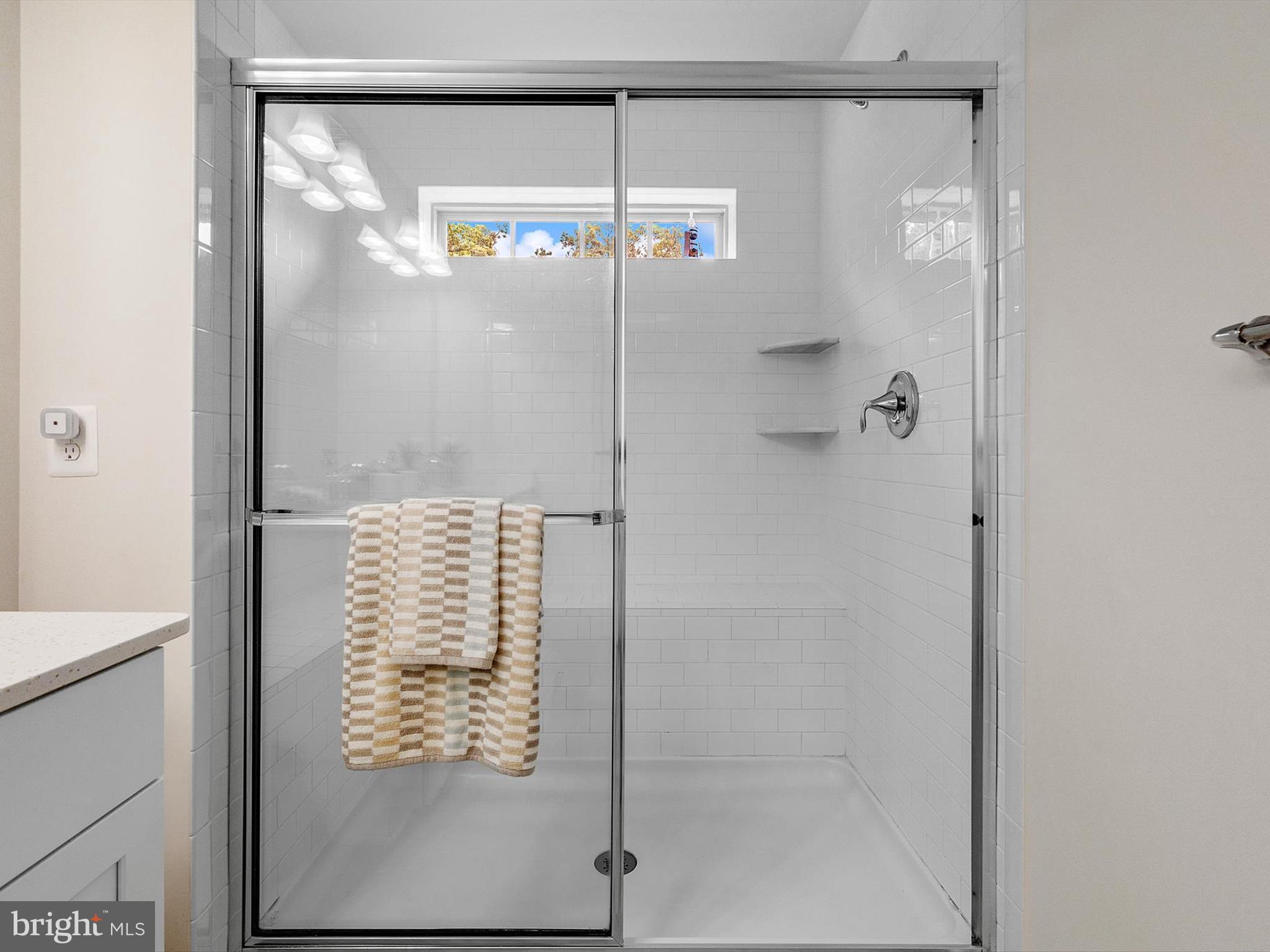 3058 Bretons Ridge Way Hanover, MD 21076 - Photo 29 of 43 a bathroom with a shower