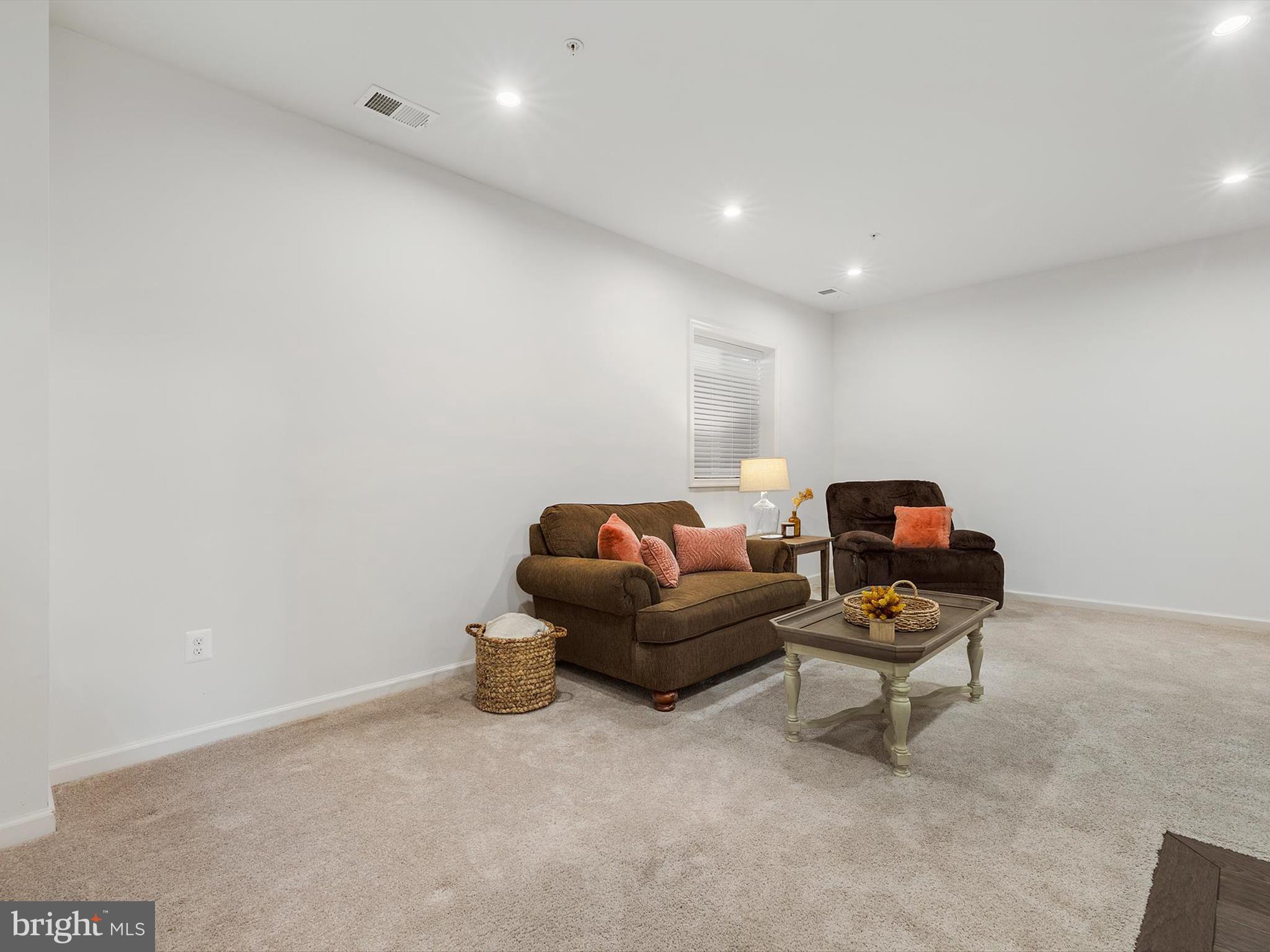 3058 Bretons Ridge Way Hanover, MD 21076 - Photo 32 of 43 a living room with furniture