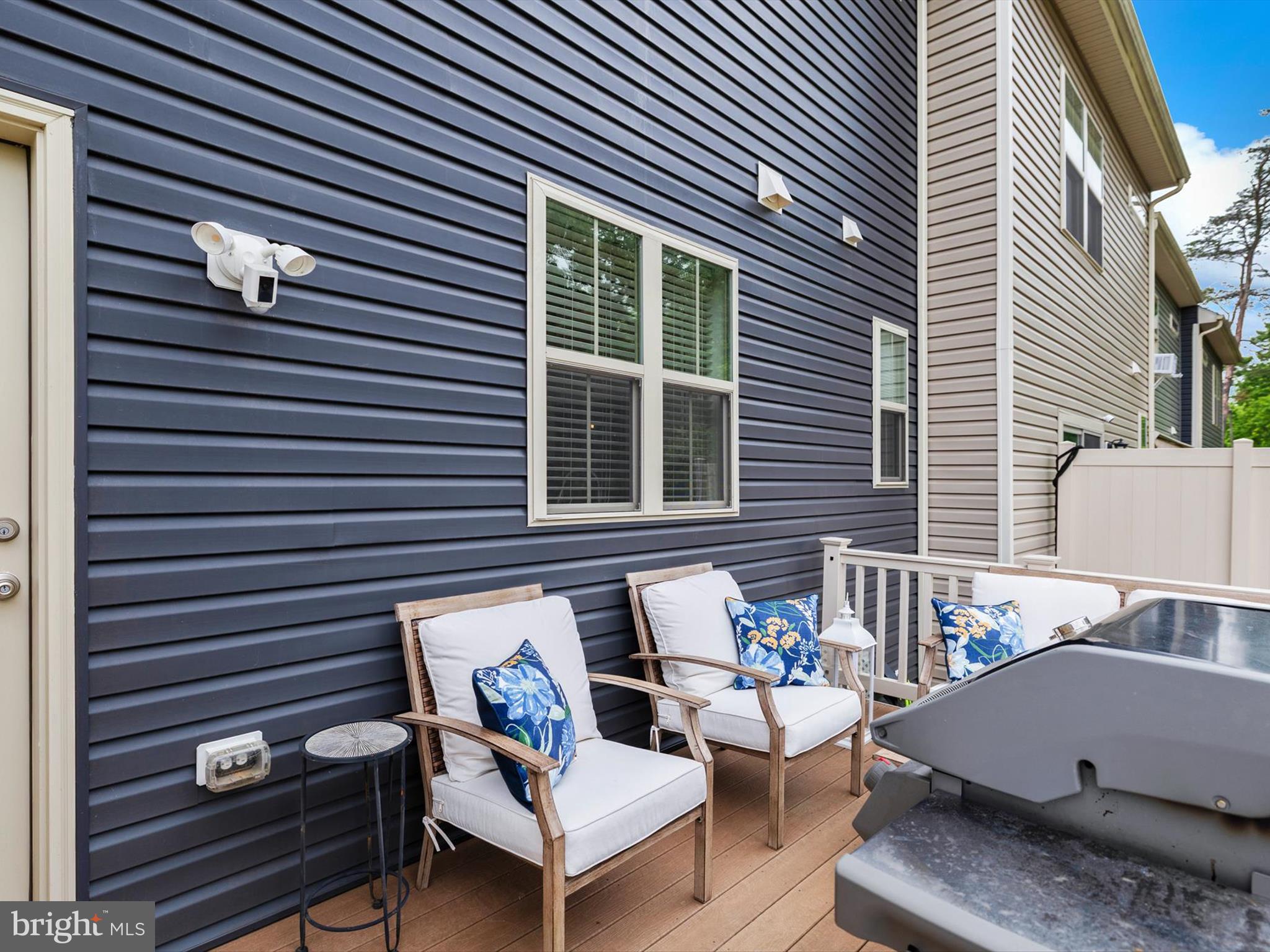 3058 Bretons Ridge Way Hanover, MD 21076 - Photo 36 of 43 a view of a patio with chairs and a potted plant