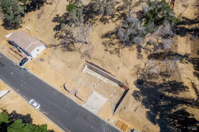 a view of a yard from a balcony
