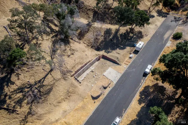 a view of balcony with wooden floor