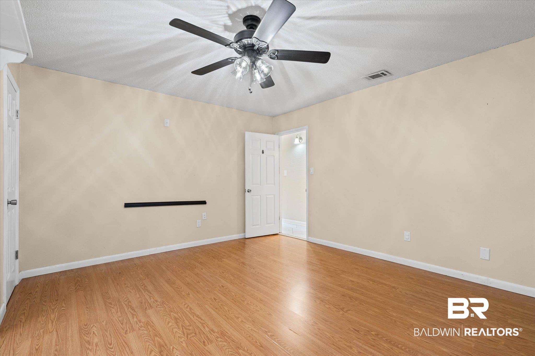 3724 Claridge Road South Mobile, AL 36608 - Photo 27 of 42 Empty room featuring light wood finished floors and ceiling fan