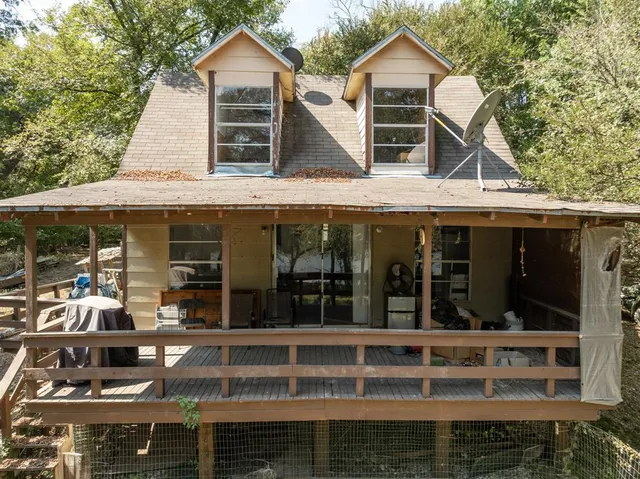 front view of a house with a balcony