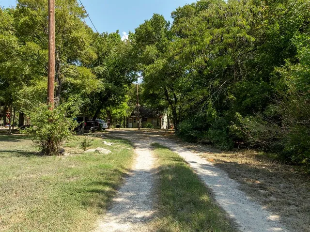 a view of swimming pool with a yard