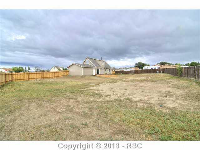 10865 Falling Star Road Fountain, CO 80817 - Photo 20 of 23 Spacious backyard 1/2 acre corner lot