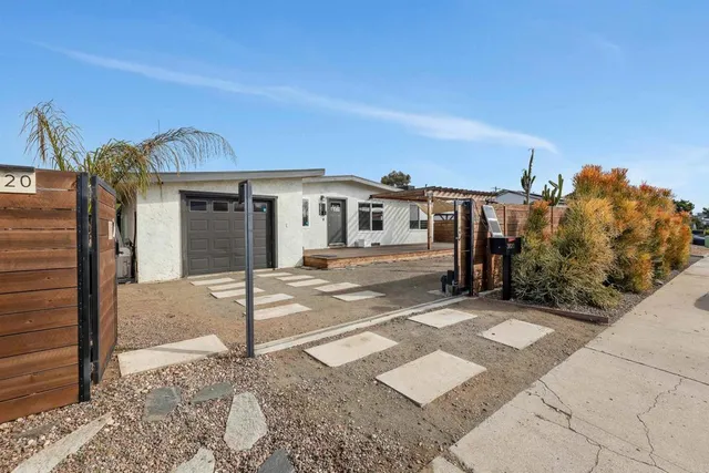 a view of a house with many windows