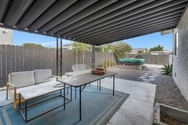 a outdoor living space with furniture and a couch