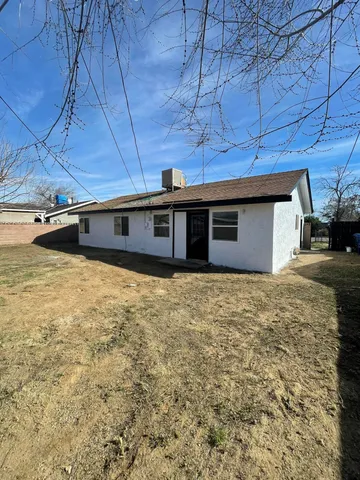 a view of a backyard of a house