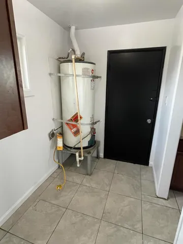 a view of a hallway with seating area