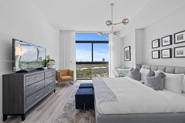 a spacious bathroom with a double vanity and a shower