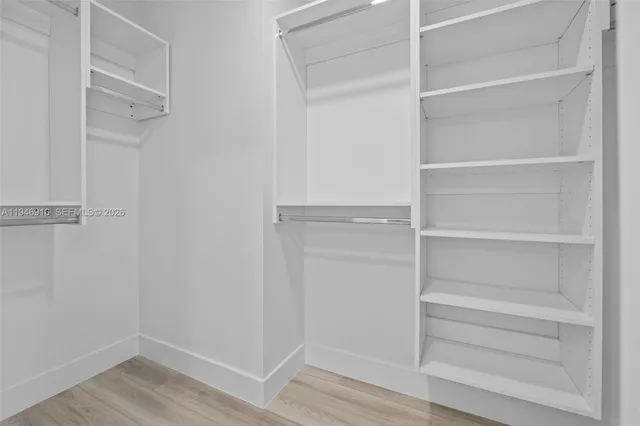 a outdoor living space with furniture and a potted plant