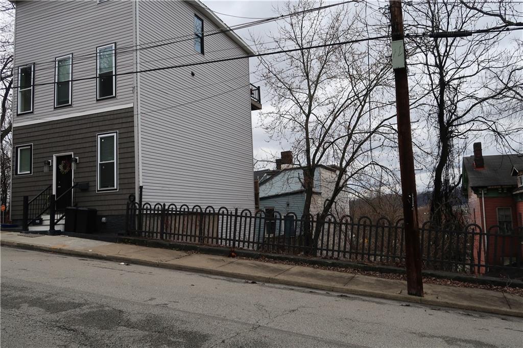 1310 Stranmore Street Pittsburgh, PA 15212 - Photo 2 of 12 a view of a house with a street