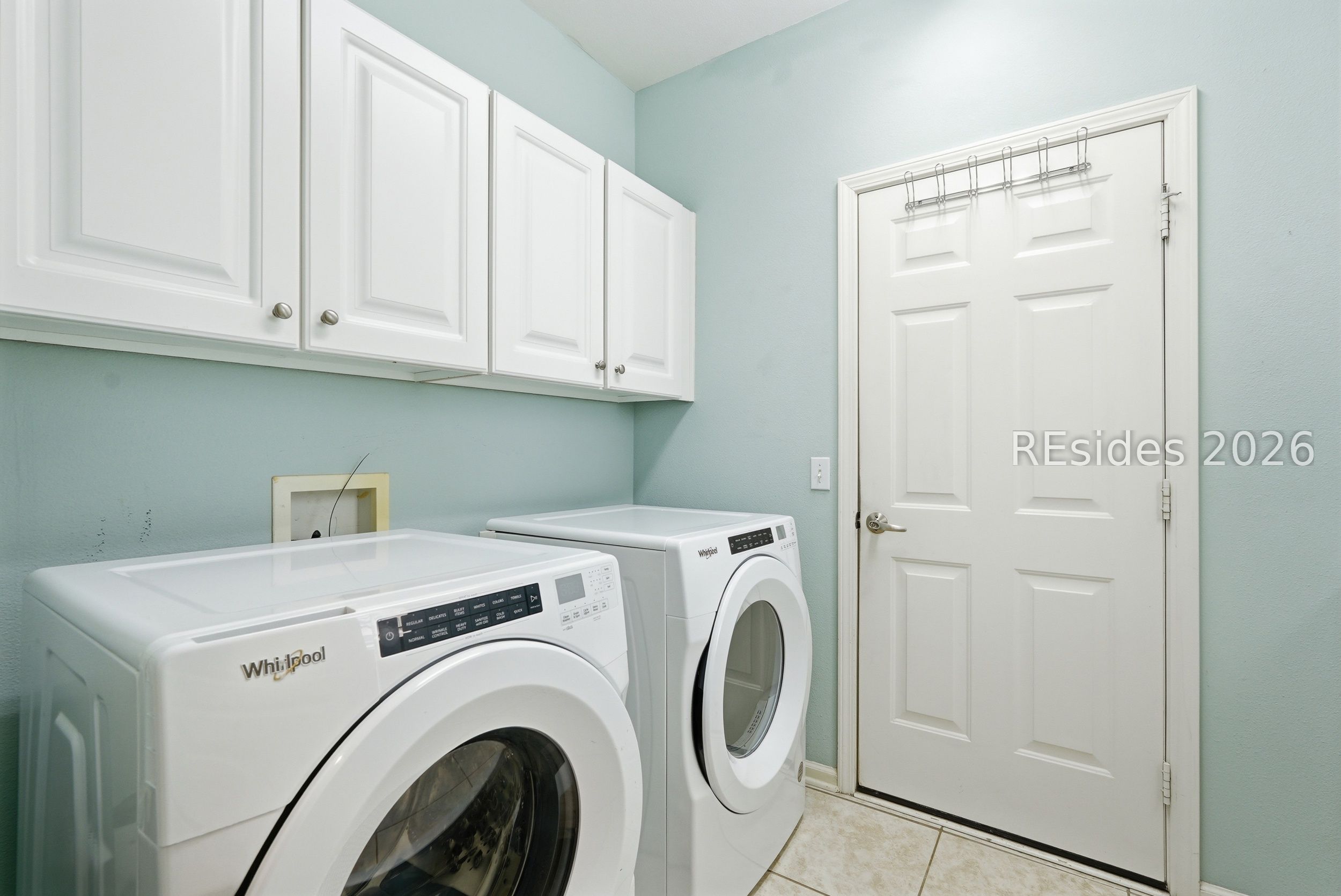 10 Fairforest Lane Bluffton, SC 29909 - Photo 27 of 37 Laundry room with extra cabinets & sink