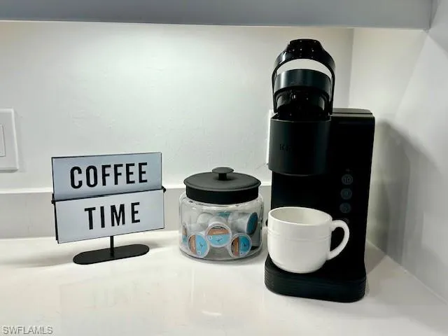 a kitchen with a sink and a stove