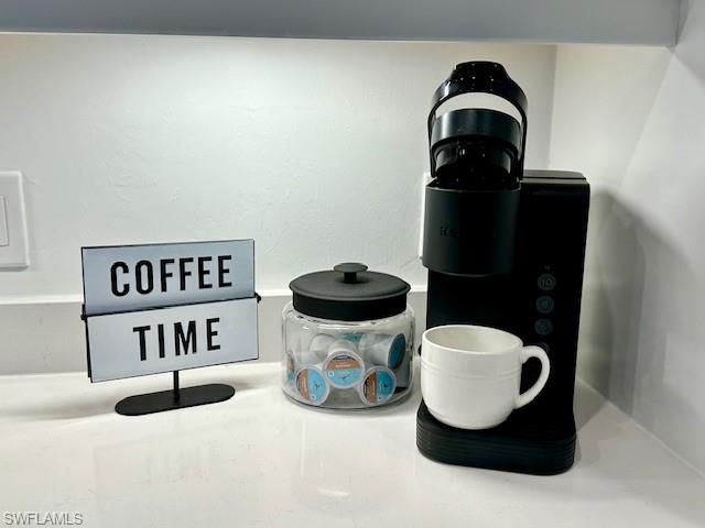 5856 Sunningdale St Avenue Immokalee, FL 34142 - Photo 27 of 44 a kitchen with a sink and a stove