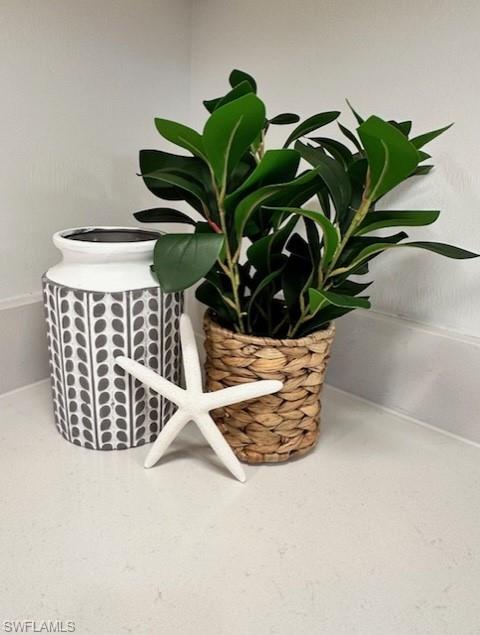 5856 Sunningdale St Avenue Immokalee, FL 34142 - Photo 29 of 44 a vase of flowers sitting on a table