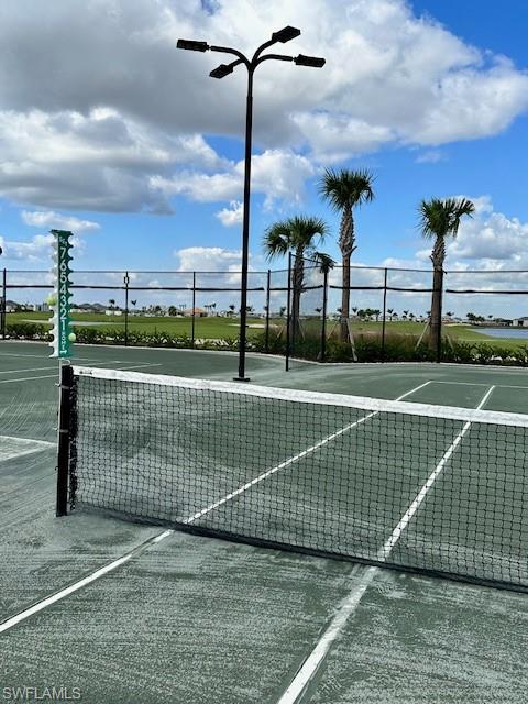 5856 Sunningdale St Avenue Immokalee, FL 34142 - Photo 36 of 44 a view of a tennis court